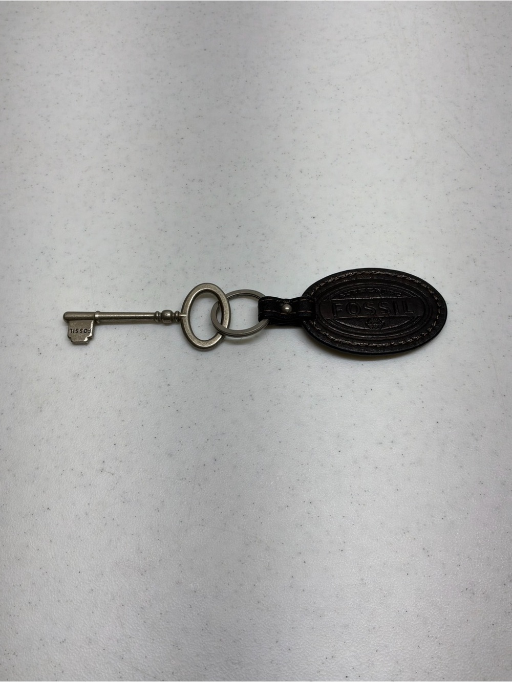 Fossil Dark Brown Leather Oval Key Fob with Metal Decorative Key
